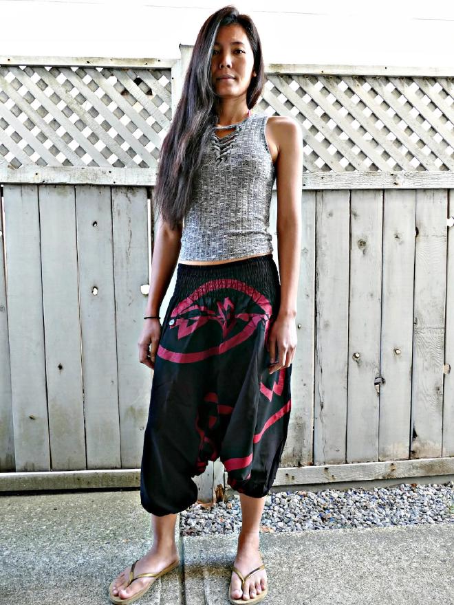 Woman wearing a black and red pair of Siamurai harem pants